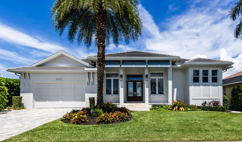A modern Florida home and its surrounding landscape protected by Arrow Environmental Services’ professional termite and pest control.
