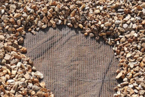 Durable pest exclusion mesh installed by Arrow Environmental Services to provide a long-term rodent barrier in Florida landscaping.