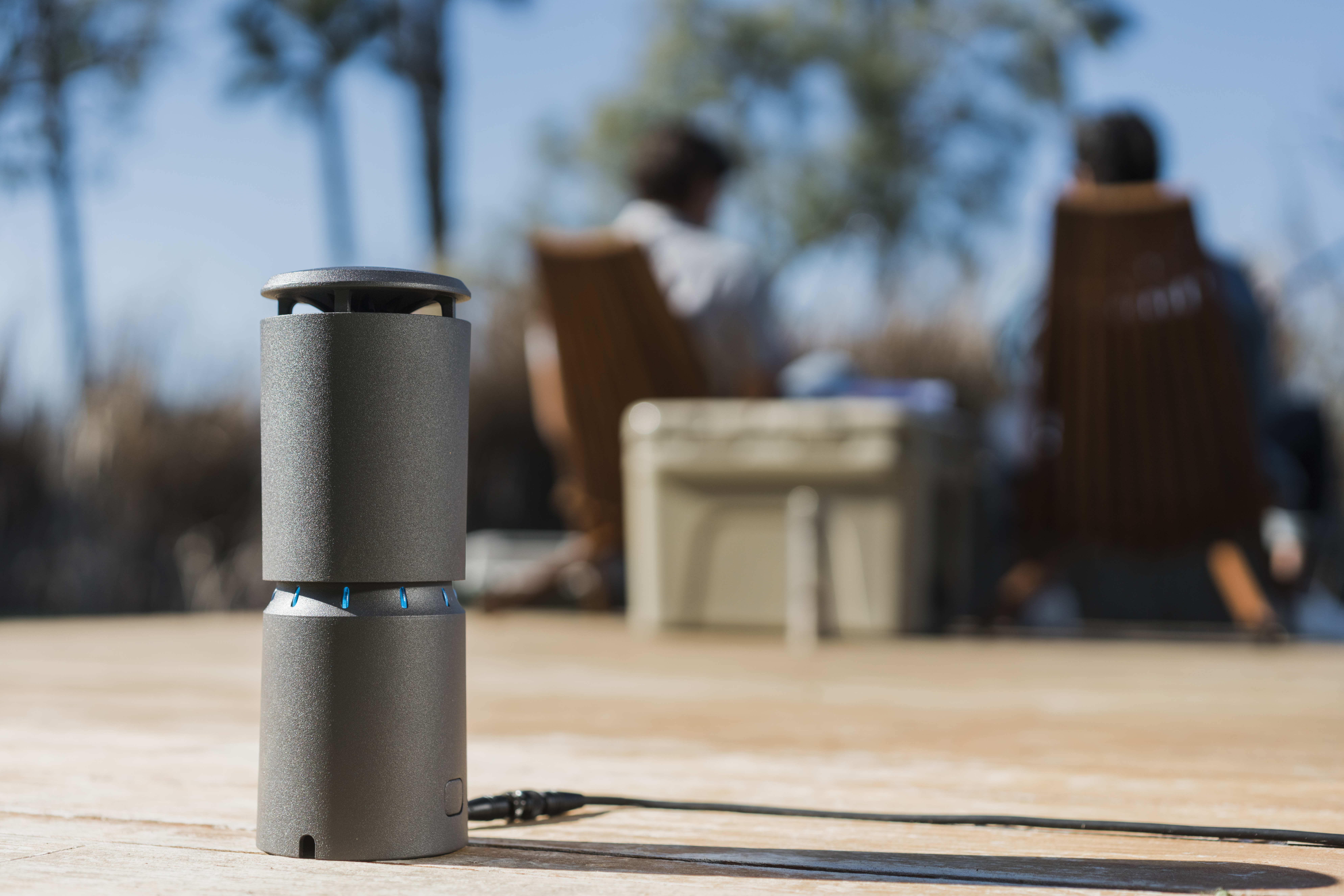 Close up of Arrow's mosquito repellent system on a patio.